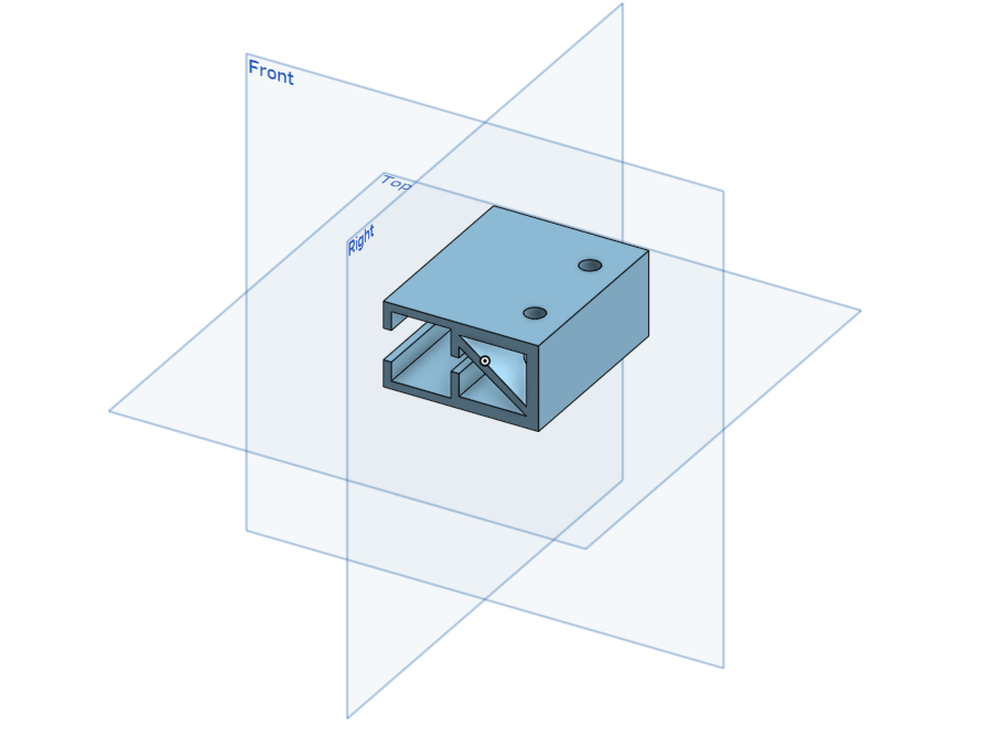 CAD model of a small box-shaped bracket with internal triangular supports and a central hole.